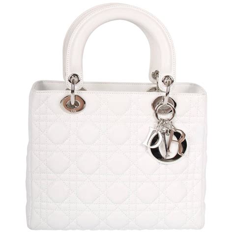 dior revolution bag white|small white dior bag.